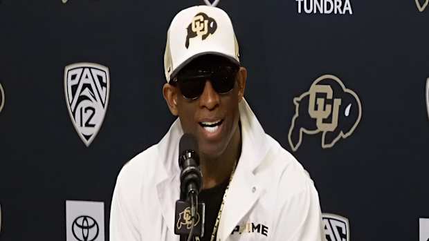 Deion Sanders at podium